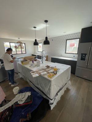 In this photo you can see that we did the backsplash for the kitchen.