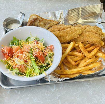 Catfish platter with fries and salad.