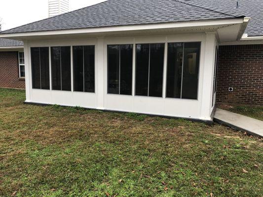 Sunroom walls under existing roof