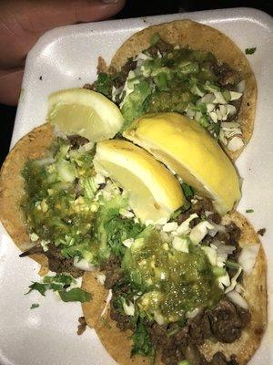 Asada tacos. The toppings (onion and cilantro) were put on with his BARE HANDS, no gloves during corona virus