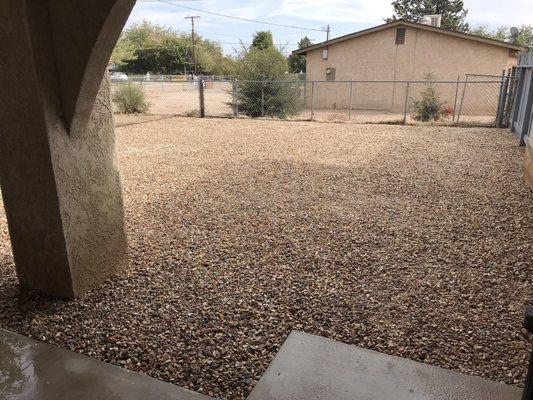 Palm Springs Rock, weed barrier & mow strip