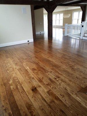 This photo is a picture of 4 inch white oak with provincial Staind. And three coats of oil-based poly.