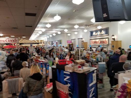 The super long line wrapping around to the sales floor