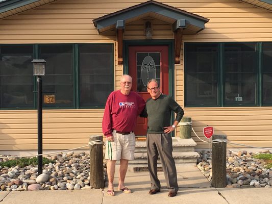 Joe and Ed, celebrating a successful closing and enjoying an Ocean Gate sunset.