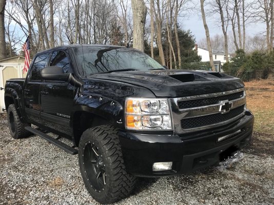 Hood and fender flares painted and installed....