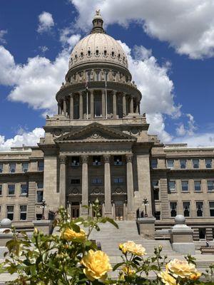 Idaho State Capitol entrance with yellow roses