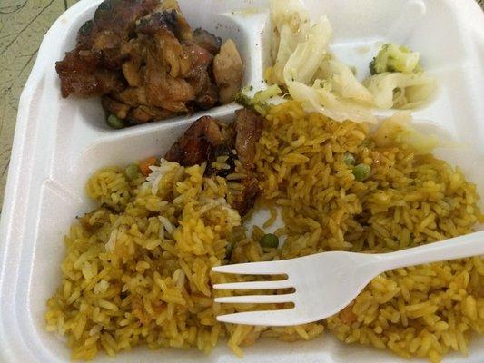 Bourbon chicken with veggies and fried rice