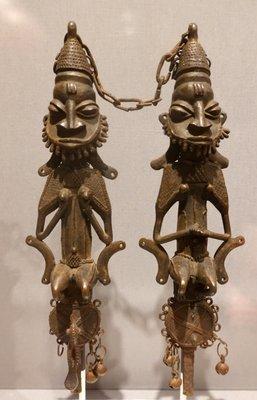 Male and female Edan Ogboni-Osugbo figures; Nigeria; Yoruba culture; 19th century; iron, brass-bronze