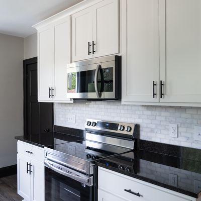 White wall and base cabinets for modern kitchen renovation