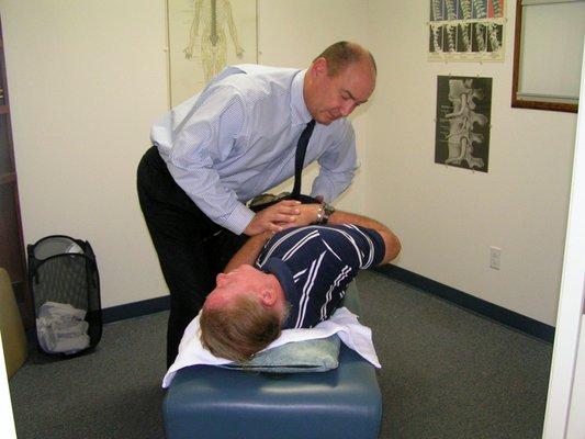 Lower lumbar and thoracic adjustment of the spine, gently moving vertebrae back into compliance with the rest of the body and its needs.