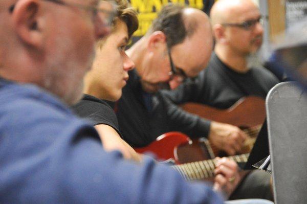 We offer group lessons on guitar and uke - and if you have a Guitar Showcase lesson certificate, your first month is free.