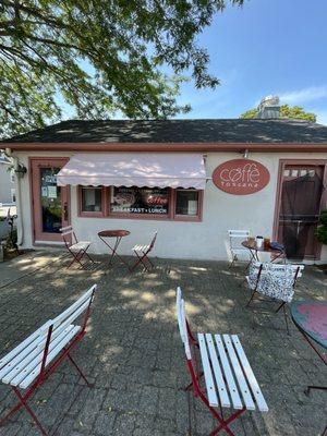 Outdoor seating in front of the little coffee shop.