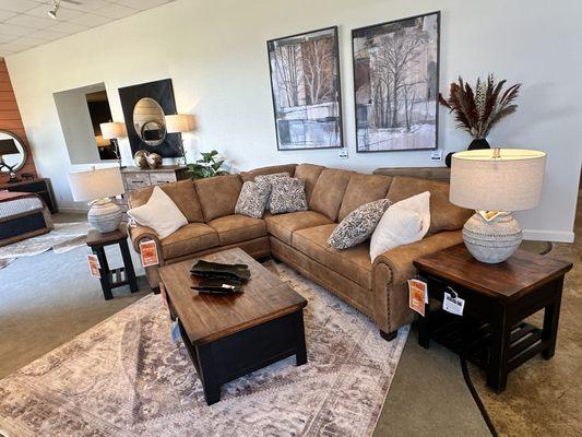 Luxurious Smith sectional accented with some beautiful Art from Leftbank