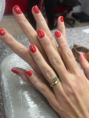 Red polish manicure