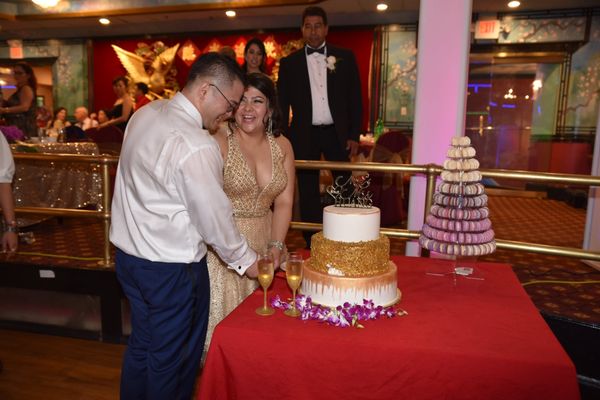 Cake cutting finally after I got my husband to stop dancing.