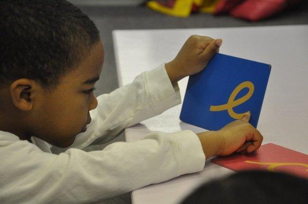 Northwoods Montessori learning tools, Sandpaper Letters teach children the shape and sound of the letters of the alphabet early as 2.5 yrs.