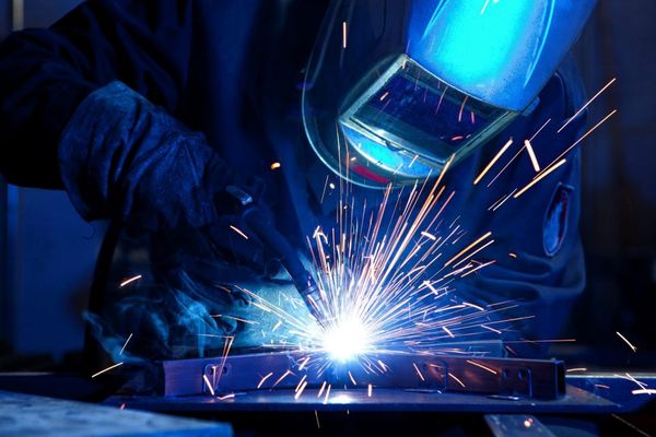 man working on welding project