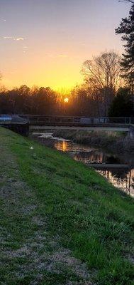 Sunset over the bridge in Goose Pond Park