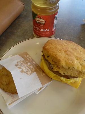 The biscuit jalapeno with cheese and a hash brown and apple juice