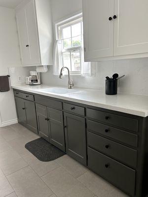 1946 original cabinets; lots of work to restore but worth it. New knobs in black matte finish.