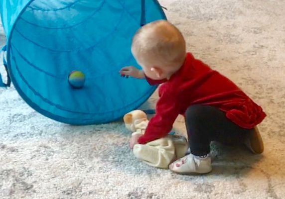 A child learning through play, at Wildwood Lane