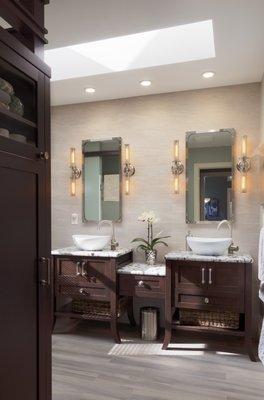 Bathroom vanity remodel with added skylight