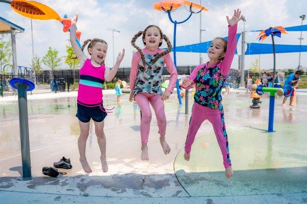 Kids enjoying the Splashpad.