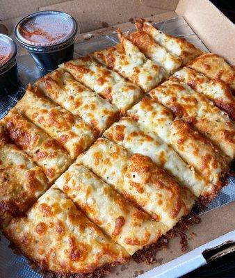 Kittanning Fox's Pizza Cheesy Breadsticks. Comes with a big marinara dipping cup. Love the crispy cheese edges!