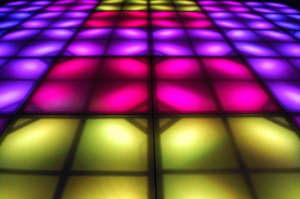 Custom LED dance floor designed with color-changing RGB strip lights and DMX from Environmental Lights by Sound Mind Events.