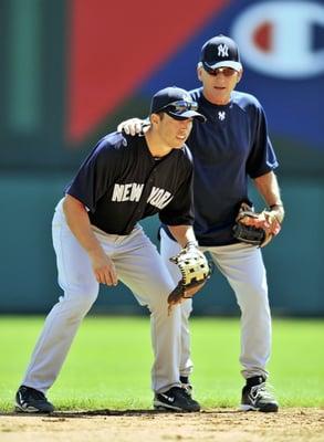 NY Yankee 1st base coach Mick Kelleher and Yankee infielder Doug Bernier.  Image by Frank Lauri