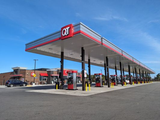 Outside the gas station and convenience store. 20 pumps for cars. Truck stop in back.