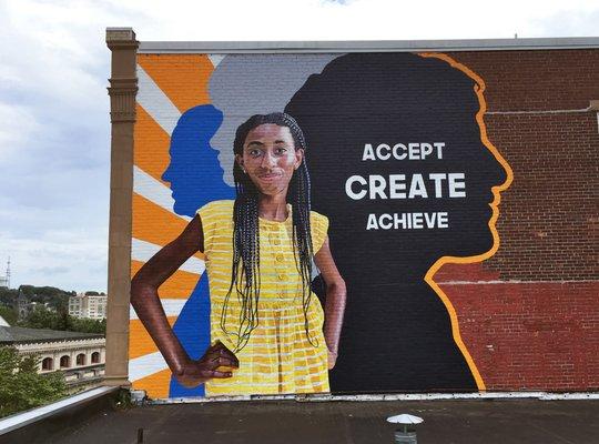 "Profiles in Courage" Mural, 22′ x 25′, Beacon Charter High School, Woonsocket, RI, 2021, by Charles C. Clear III and Bonnie Lee Turner