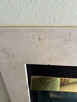 Cracked tile on fire place