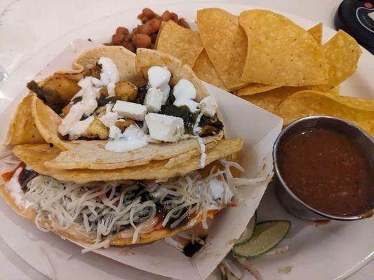 Veg taco, breakfast taco, chips and salsa, beans