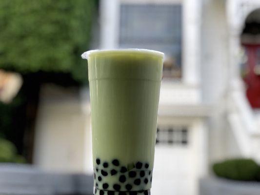 Honeydew melon milk tea with boba