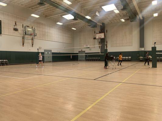 One side of the two volleyball courts set up