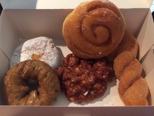 Blueberry, lemon filled, apple fritter, cinnamon roll and twist