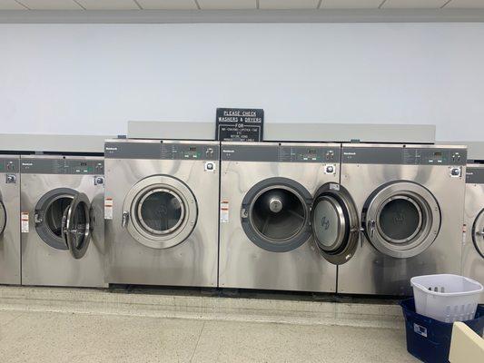 Plenty of extra large industrial washers and dryers for comforters and heavy items.