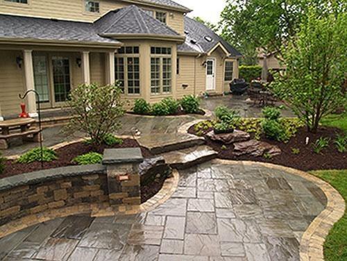 Stamped concrete / stone veneer /  block walls / low voltage lighting /  custom landscape