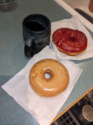 Large donuts!  The coffee mug is a 14oz stoneware mug dwarfed by the donuts.  This is a sugar glazed and a marion berry glazed donut.