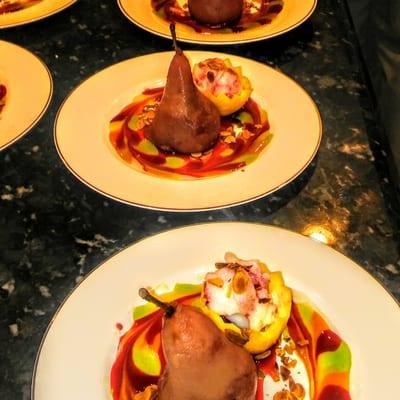 Sangria vanilla poached pear lemon sorbet raspberry sauce. Toasted almond. Caramel white chocolate strawberry sauce kiwi