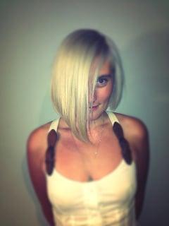 Beautiful icy blond on asymmetrical bob.