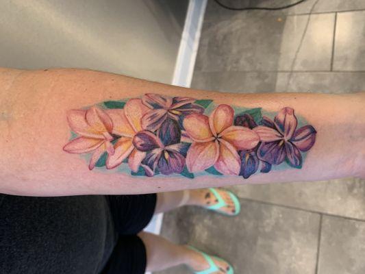 Plumeria a African violet tattoo