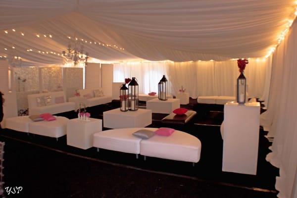 Gorgeous tent with drapery and couch rentals from Fabulous Events