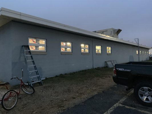 Replacing windows at coast gaurd yard