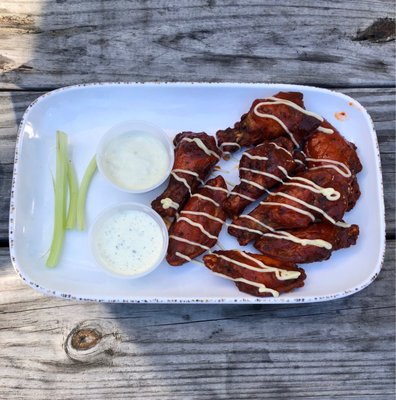 Gochujang wings with both a ranch and a blue cheese dressing