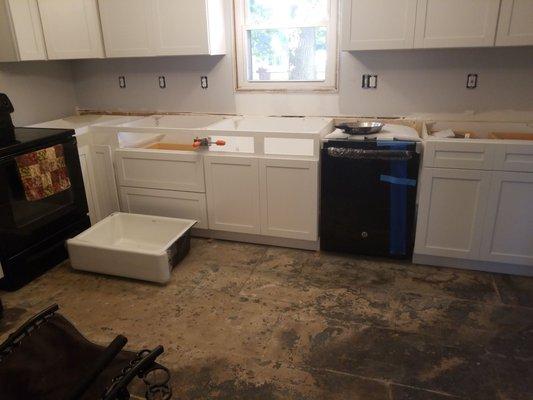 This is how our kitchen has looked for 5 months now. No sink. No countertop. No flooring. The work of Ron Melvin.