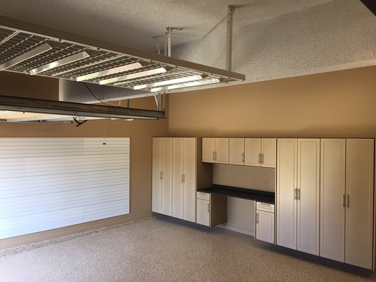 Garage cabinets, Slotwall, and overhead racks. We can do it all!