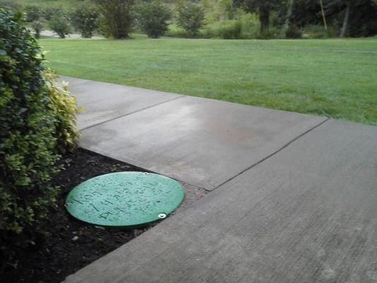 This nice side walk is on top of the septic tank. We had to cut some of the sidewalk out before we could cut a hole into the ...