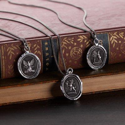 Pyrrha: Hand stamped  Talismans made from 18th & 19th Century wax seals. Available in solid Bronze or Sterling Silver.